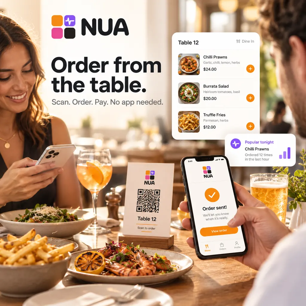 A server taking an order at the table on a handheld device.